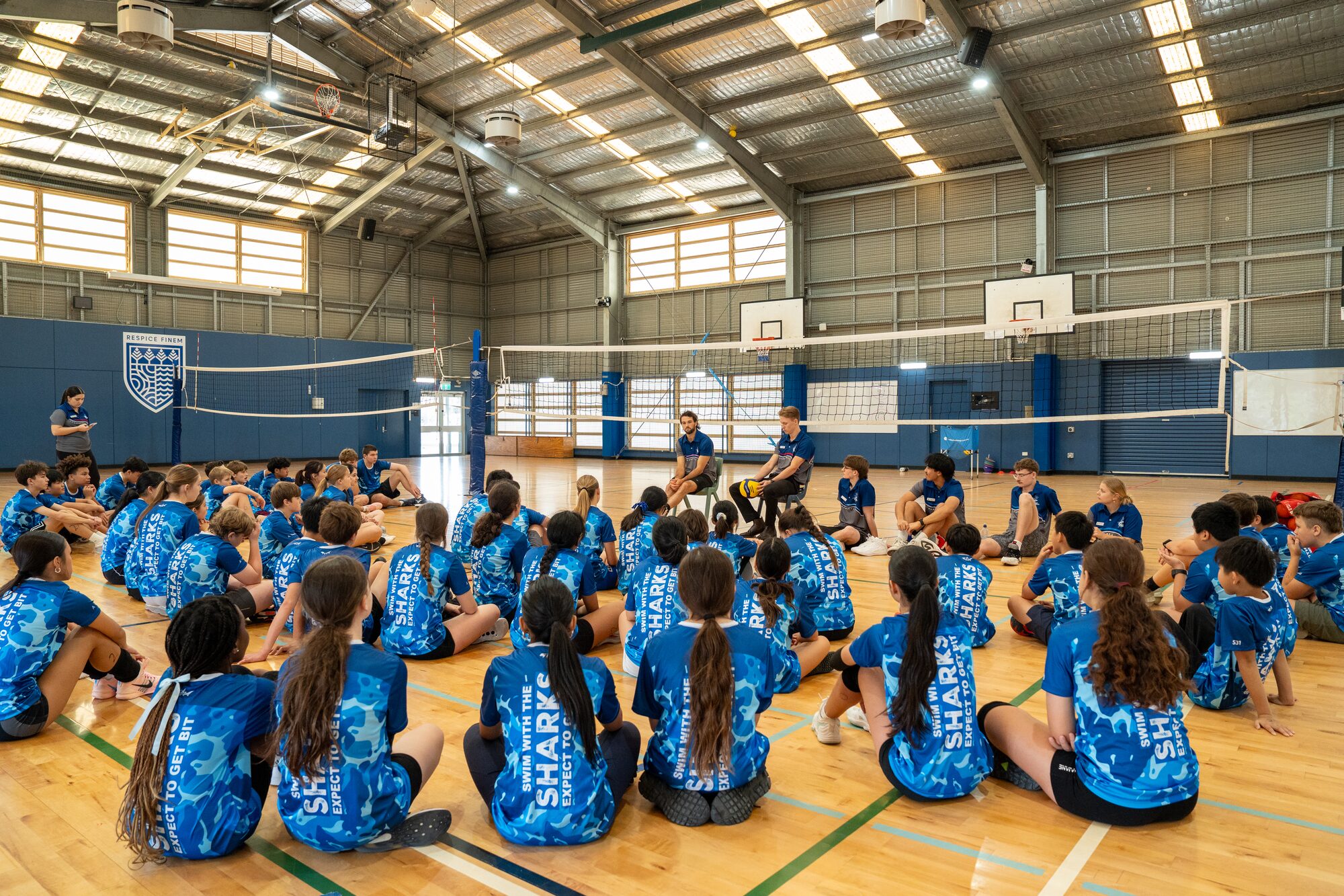 Sharks Camp athletes and coaches gathered for a group briefing