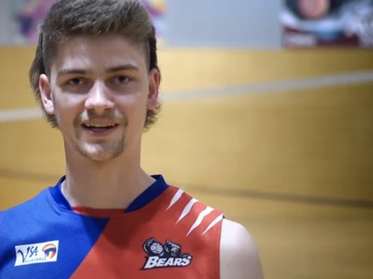 Jackson Holland in a volleyball uniform during an interview